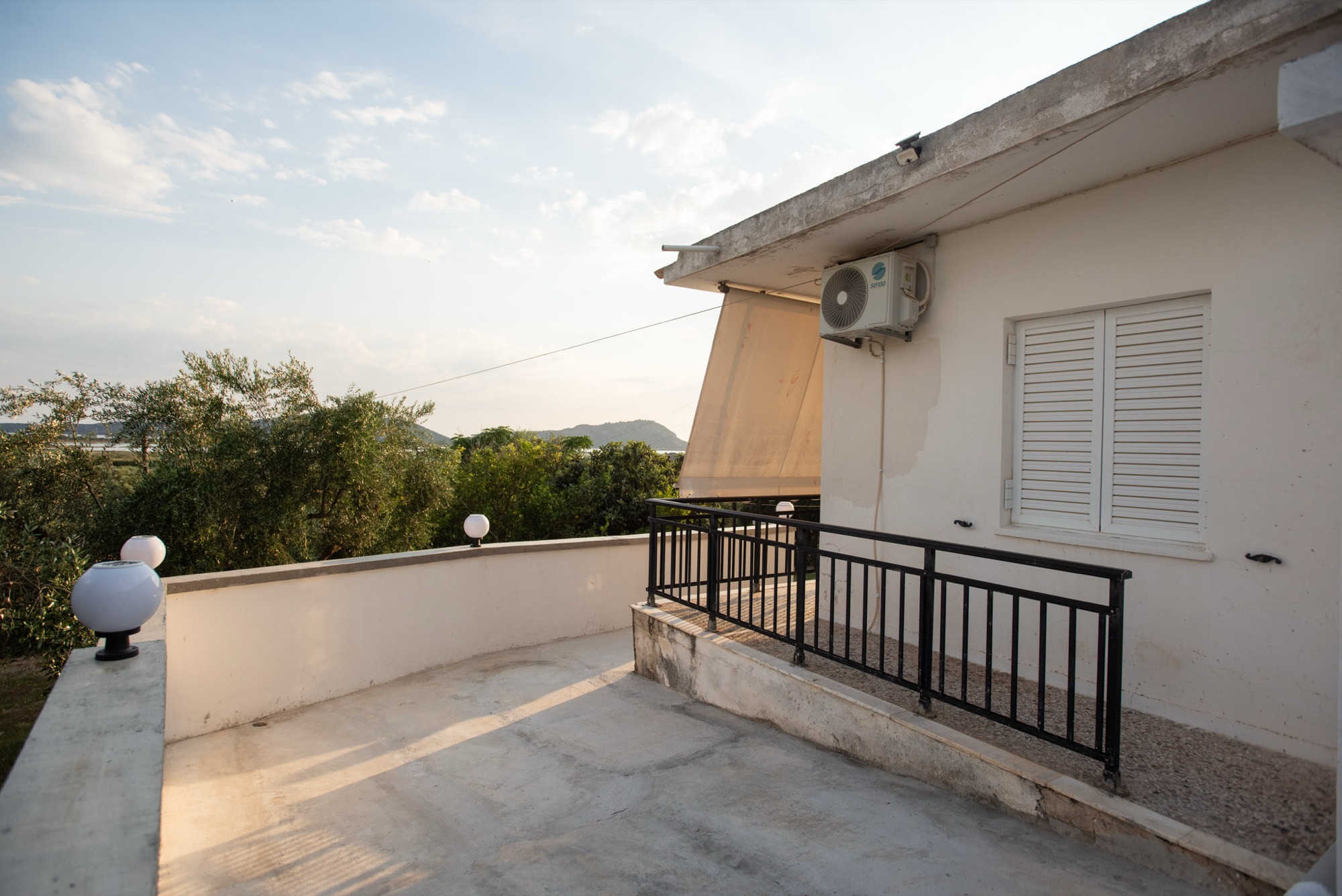 Balcony terrace lit by evening light