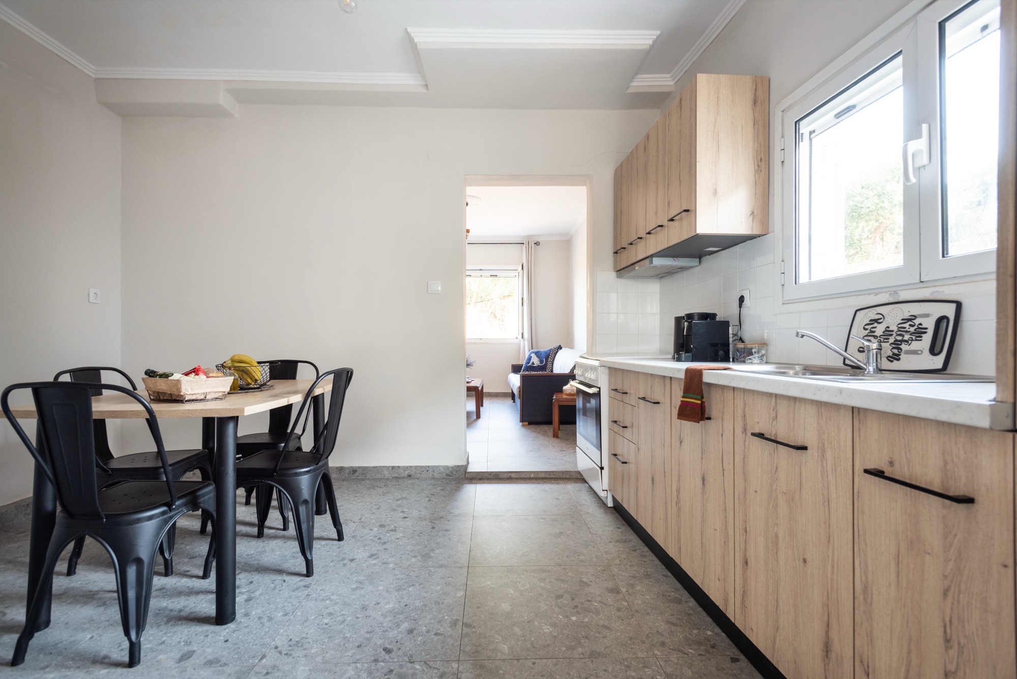 Kitchen and dining area opening onto the living room